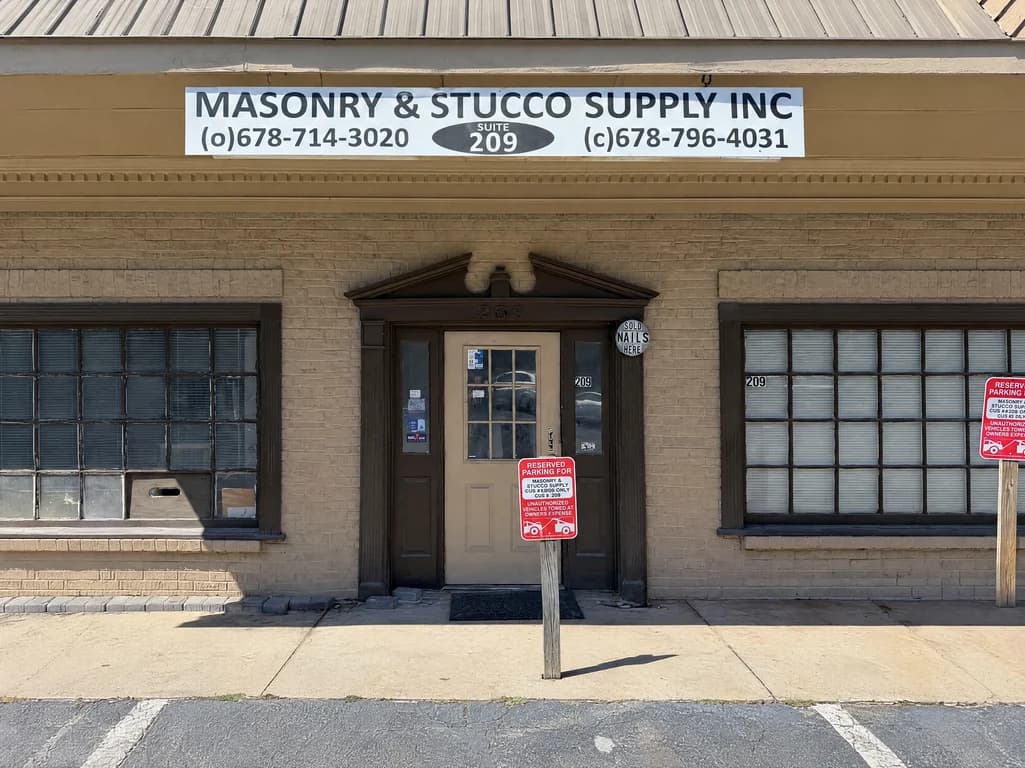 La entrada de la Suite 209 en 50 Old Peachtree Rd, Suwanee — donde se recoge el pedido