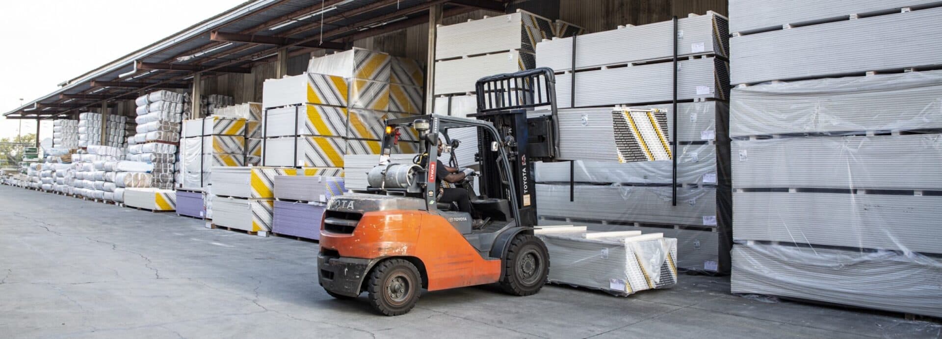 Building-materials warehouse stocked with stucco and supplies